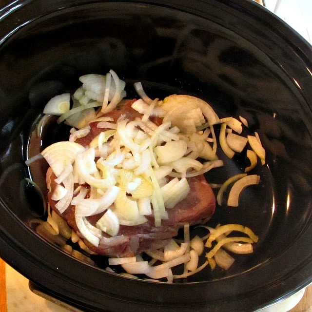Beef and onion in a slow cooker