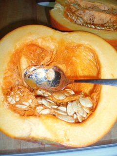 Scooping Out Pumpkin Seeds