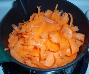 Carrots in heavy pan - Inhabited Kitchen