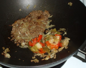 Food browning in pan - Inhabited Kitchen