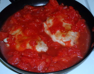Tomatoes in Pan with Pork Chops