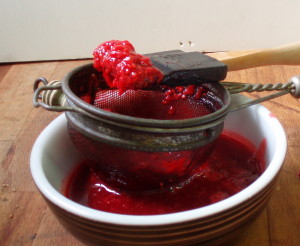 Straining Berries - Inhabited Kitchen