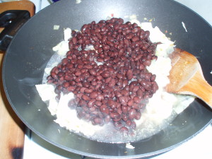 adding black beans - inhabitedkitchen.com