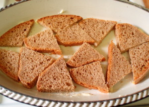 First layer of bread for Cheese Strata - Inhabited Kitchen