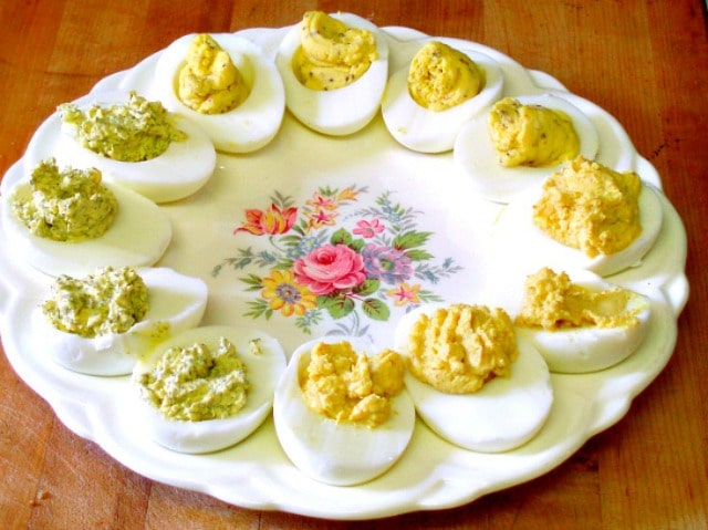 Three different recipes for stuffed eggs - perfect for using Easter Eggs, serving on a buffet, or taking to a potluck!
