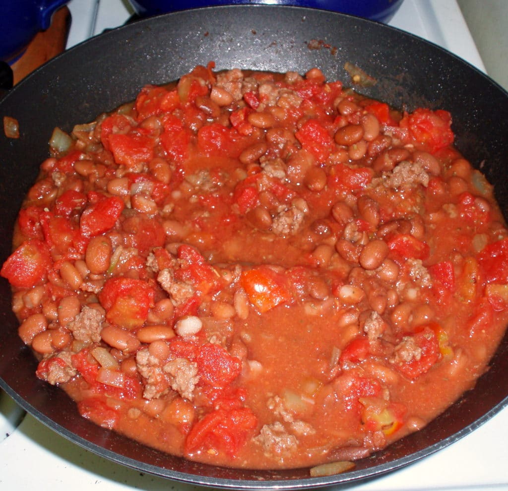 Quick chili, simmering - Homemade nearly as afast as canned - www.inhabitedkitchen.com