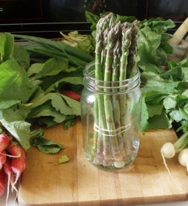 Asparagus in a jar of water - www.inhabitedkitchen.com