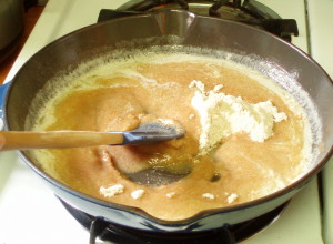 Adding flour to roux - inhabitedkitchen.com