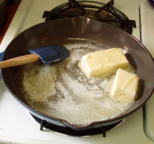 Melting butter for roux - inhabitedkitchen.com