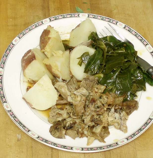 Collard greens with potatoes and pork - www.inhabitedkitchen.com