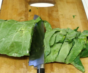 Rolling collards to chop them easily - www.inhbaitedkitchen.com