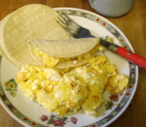 Cheesy eggs in tortillas - www.inhabitedkitchen.com