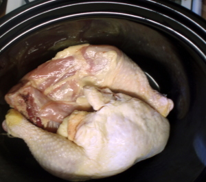 Raw chicken legs in slow cooker - www.inhabitedkitchen.com