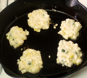 Fritter batter dropped in pan - www.inhabitedkitchen.com