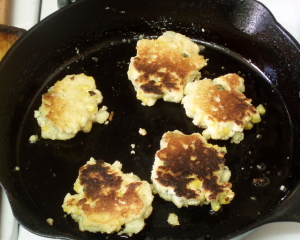 Corn fritters in cast iron pan - www.inhabitedkitchen.com