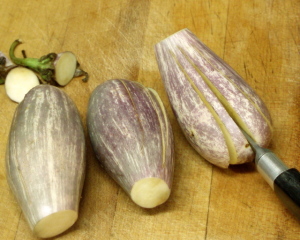 Slicing eggplant into fans - www,inhabitedkitchen.com