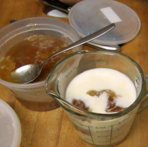 Adding drippings to milk for gravy - www.inhabitedkitchen.com