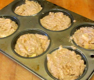 apple cinnamon batter in muffin tin - www.inhabitedkitchen.com