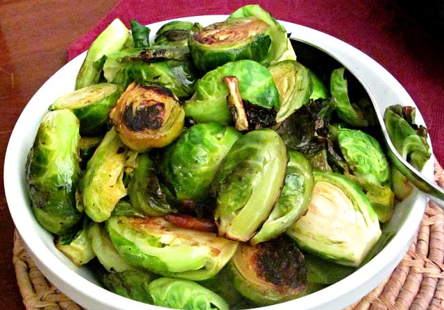 A slightly dressier vegetable dish, pan roasted Brussels sprouts with bacon are wonderful for either a simple meal that needs punch, or a holiday table.