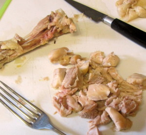 Cutting chicken off the bone - www.inhabitedkitchen.com