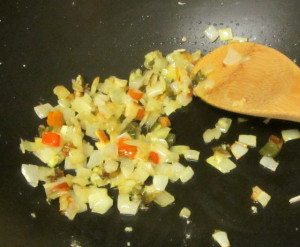 Saute aromatics for pasta sauce - www.inhabitedkitchen.com