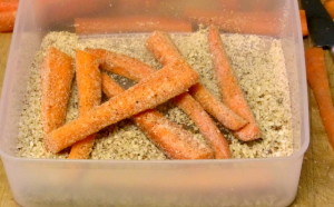 Coating carrots with almond meal - www.inhabitedkitchen.com