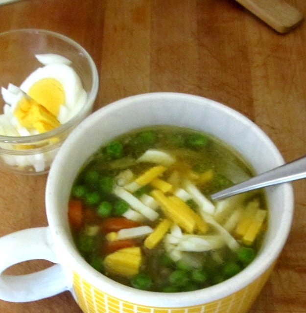 Lentil soup with vegetables, garnished with egg - www.inhabitedkitchen.com