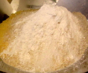 Dry ingredients for corn muffin mix in bowl - www.inhabitedkitchen.com