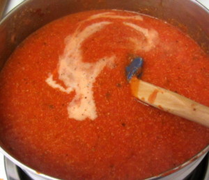 Stirring milk into Almost Instant Cream of Tomato Soup - www.inhabitedkitchen.com 