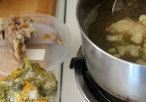 Turning plain lentils into soup, by adding leftover meat and vegetables - www.inhabitedkitchen.com
