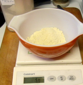 Weighing gf flour - www.inhabitedkitchen.com