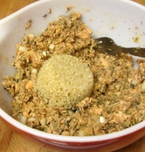 Adding cooked quinoa to makle a gluten free salmon patty - www.inhabitedkitchen.com