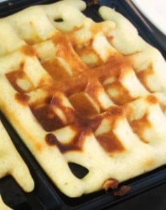 baking the waffle in the iron - www.inhabitedkitchen.com