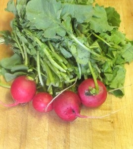 Keep and cook the greens from those radishes, for a bright accent vegetable - www.inhabitedkitchen.com