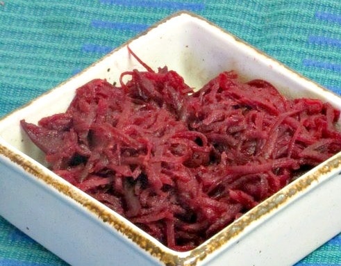 Shred beets and saute them in butter - with a little orange juice to brighten them - for a lighter feeling vegetable - www.inhabitedkitchen.com