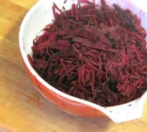 Shred beets and saute them in butter - with a little orange juice to brighten them - for a lighter feeling vegetable - www.inhabitedkitchen.com