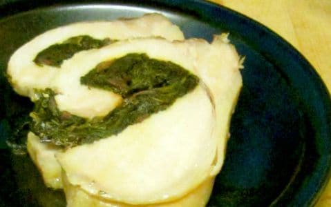 Slow cooked stuffed pork loin, with a green swirl of chard and herbs - and easy, decorative recipe even on a hot day. www.inhabitedkitchen.com