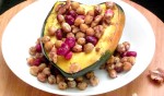 Use cranberries and chickpeas for a stuffed squash that is both simple and elegant. Great as part of a vegan meal!
