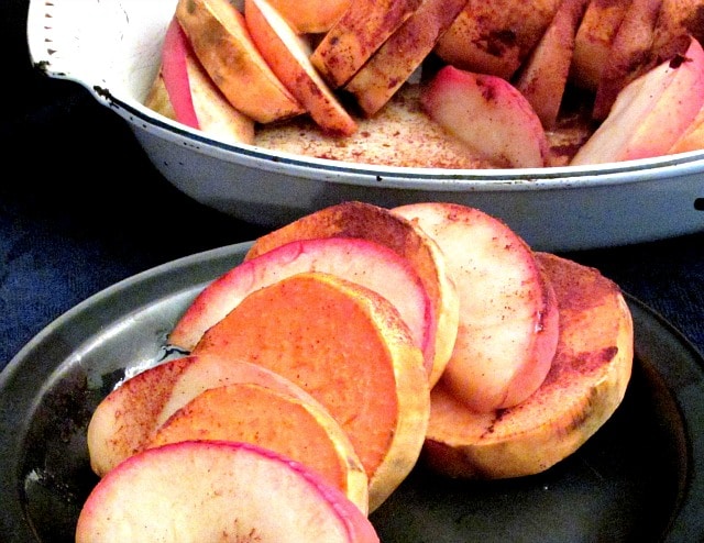 Bake sweet potatoes with apples, for an attractive, elegant, slightly sweet presentation. 