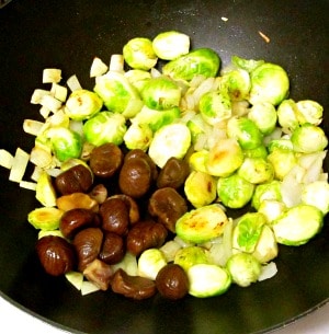 Brussels Sprouts and chestnuts, tossed in cooked rice, for a festive and delicious winter side dish. 