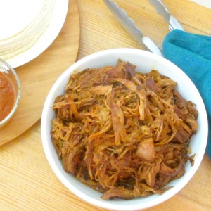 Make this easy slow cooker pulled pork with a smoky spicy sauce made of chipotle in adobo. 