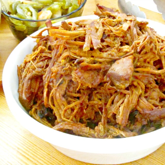 Make this easy slow cooker pulled pork with a smoky spicy sauce made of chipotle in adobo. 