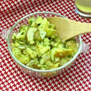 Potato salad made with an herbed oil and vinegar dressing - excellent for lunch boxes, picnics, and anyplace you want a lighter salad - and no mayo!