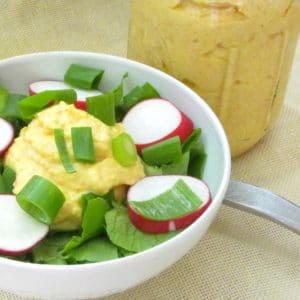 Use silk tofu to make this creamy, vegan carrot ginger salad dressing. Lovely with a tossed salad, a grain based salad, or as a dip. 