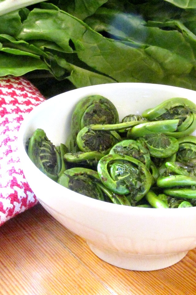 Fiddleheads - the edible and delicious unopened fronds of a wild fern. Harvested for a few short weeks in late Spring, they are sold in farmer's markets.