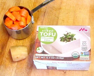 Use silk tofu to make this creamy, vegan carrot ginger salad dressing. Lovely with a tossed salad, a grain based salad, or as a dip. 