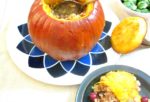 A vegan Stuffed Pumpkin gives everyone an impressive dish to serve at a Thanksgiving dinner - or for Halloween!