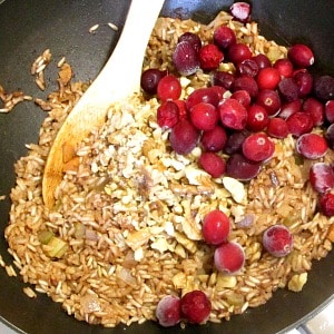 A vegan Stuffed Pumpkin gives everyone an impressive dish to serve at a Thanksgiving dinner.