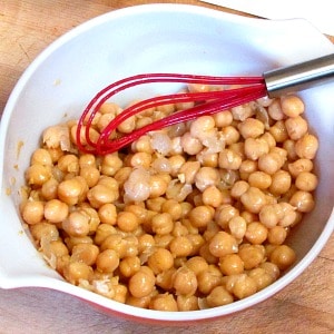 Marinate chickpeas for a flavorful addition to a salad. This easy recipe takes only five minutes, but adds so much to your meal! 