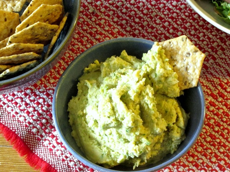 A surprisingly gentle green garlic flavor makes Garlic Scape Hummus a delightful spread for lunch or a party! Enjoy it during the short season for scapes!